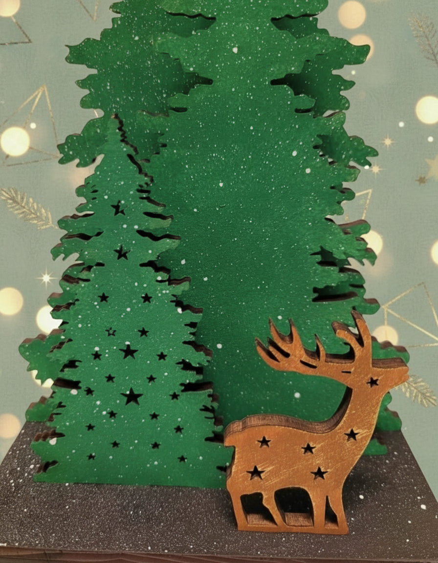 Decorative Christmas tree and deer figure on a stand with festive lights.